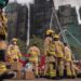 Hong Kong apartment blaze: Police arrest 13 suspects in fire probe as death toll hits 151